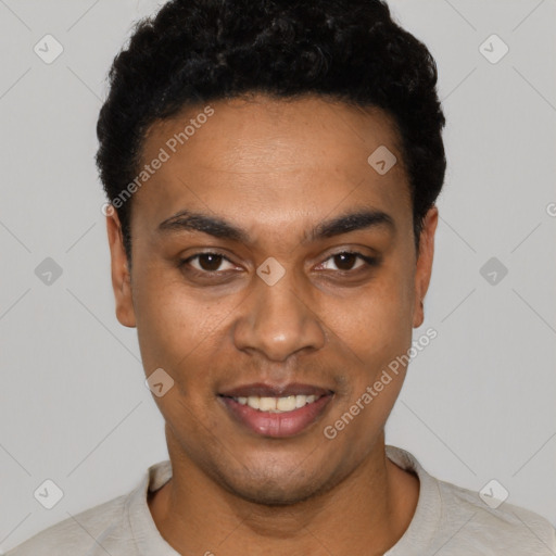 Joyful black young-adult male with short  black hair and brown eyes