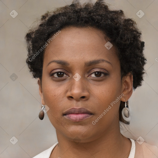 Neutral black young-adult female with short  brown hair and brown eyes