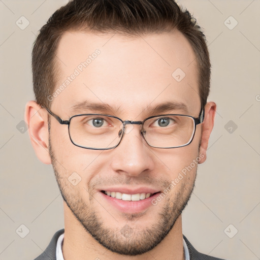 Joyful white young-adult male with short  brown hair and grey eyes