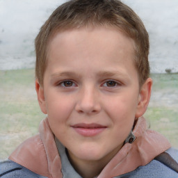 Joyful white child male with short  brown hair and brown eyes