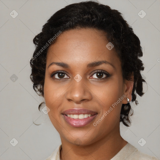 Joyful black young-adult female with medium  brown hair and brown eyes