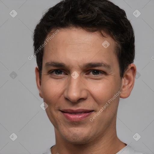 Joyful white young-adult male with short  brown hair and brown eyes