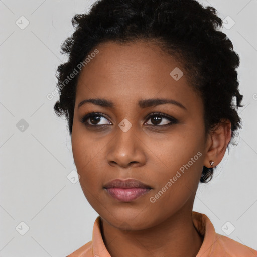 Neutral black young-adult female with short  black hair and brown eyes