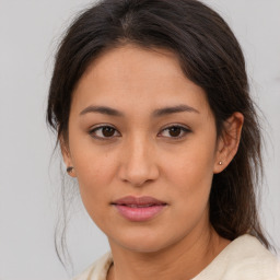 Joyful asian young-adult female with medium  brown hair and brown eyes