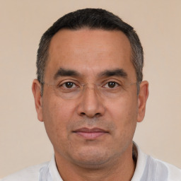 Neutral white adult male with short  black hair and brown eyes
