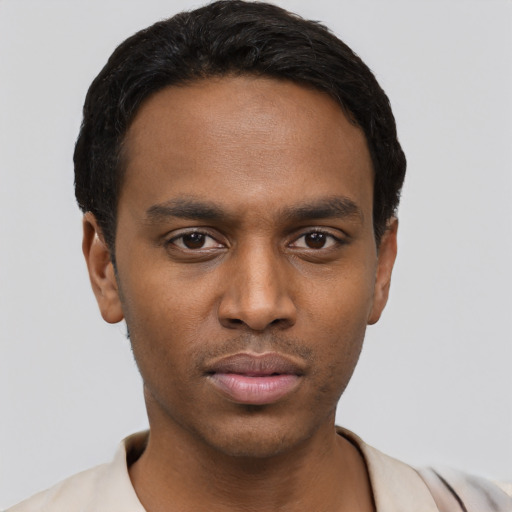 Neutral black young-adult male with short  black hair and brown eyes