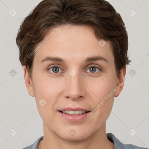 Joyful white young-adult female with short  brown hair and grey eyes