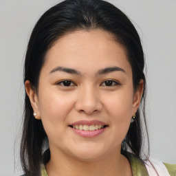 Joyful white young-adult female with medium  brown hair and brown eyes