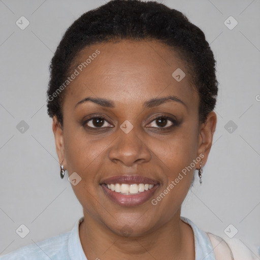 Joyful latino young-adult female with short  brown hair and brown eyes