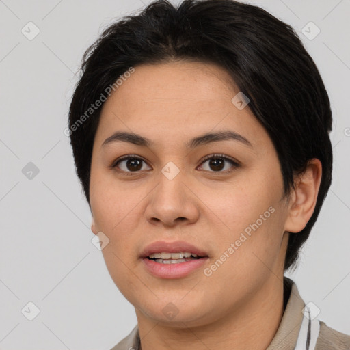 Joyful asian young-adult female with short  brown hair and brown eyes