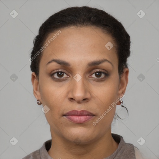 Joyful latino young-adult female with short  brown hair and brown eyes