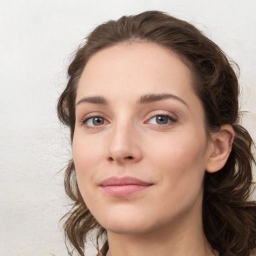 Neutral white young-adult female with medium  brown hair and blue eyes