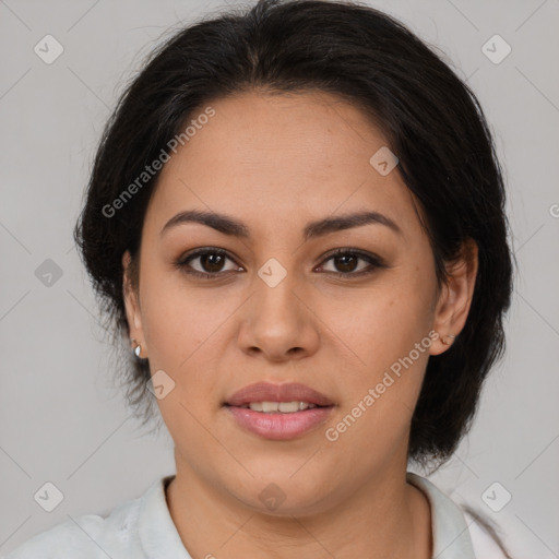 Joyful latino young-adult female with medium  brown hair and brown eyes