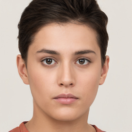 Neutral white young-adult female with short  brown hair and brown eyes