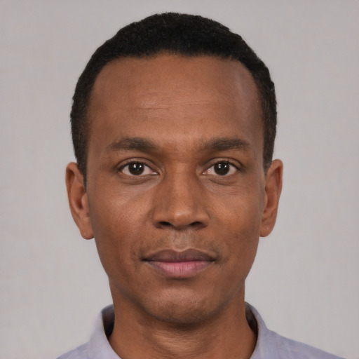 Neutral black young-adult male with short  black hair and brown eyes