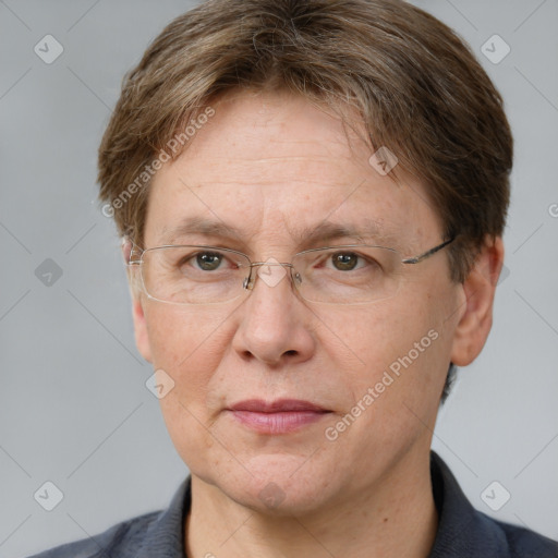 Joyful white adult female with short  brown hair and grey eyes