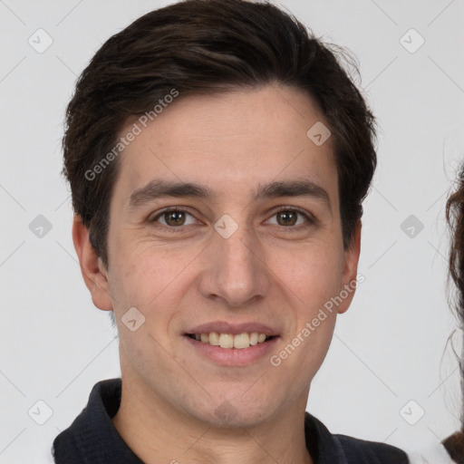 Joyful white young-adult male with short  brown hair and brown eyes