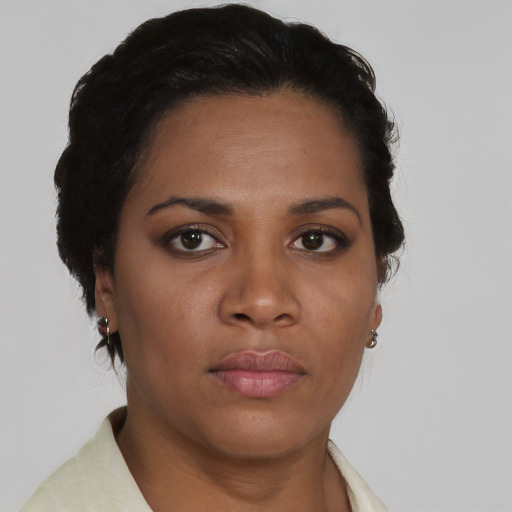 Neutral black young-adult female with short  black hair and brown eyes