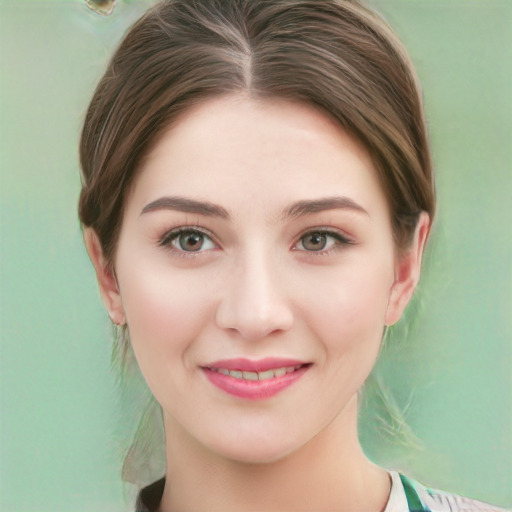 Joyful white young-adult female with medium  brown hair and green eyes