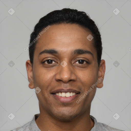 Joyful latino young-adult male with short  black hair and brown eyes