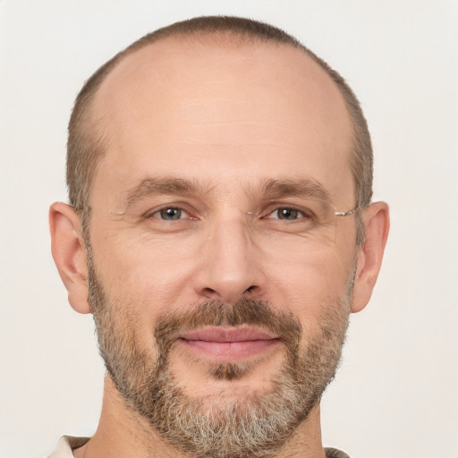 Joyful white adult male with short  brown hair and grey eyes