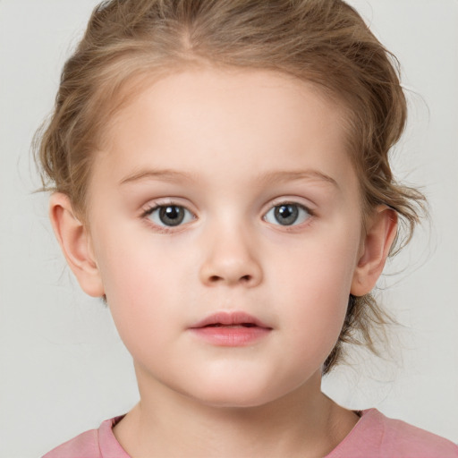 Neutral white child female with medium  brown hair and blue eyes