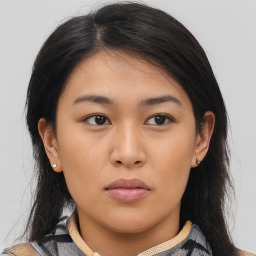 Neutral asian young-adult female with medium  brown hair and brown eyes