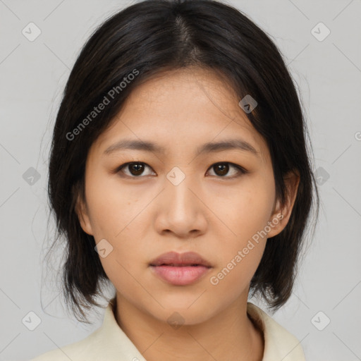 Neutral asian young-adult female with medium  brown hair and brown eyes