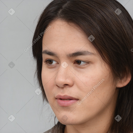 Neutral white young-adult female with long  brown hair and brown eyes