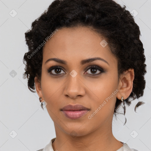 Joyful latino young-adult female with short  black hair and brown eyes