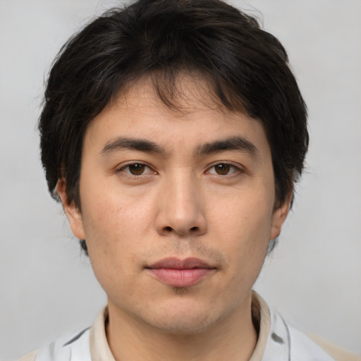 Neutral asian young-adult male with short  brown hair and brown eyes