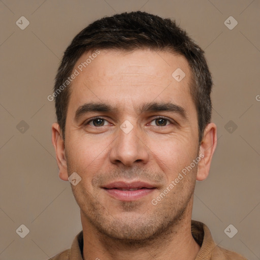 Joyful white adult male with short  brown hair and brown eyes