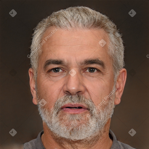 Neutral white middle-aged male with short  gray hair and brown eyes