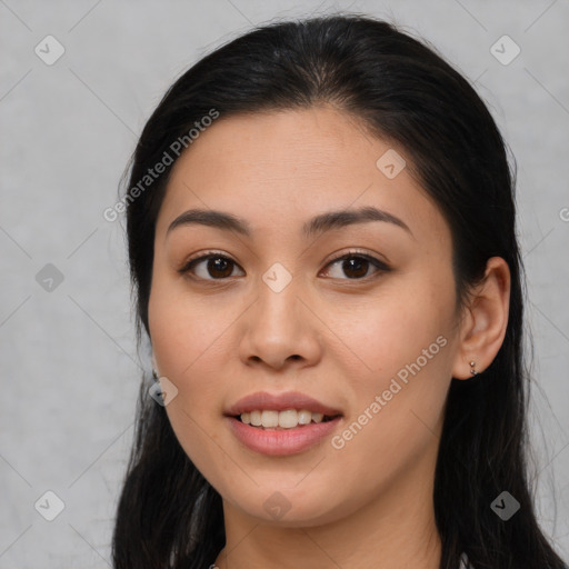 Joyful asian young-adult female with long  brown hair and brown eyes