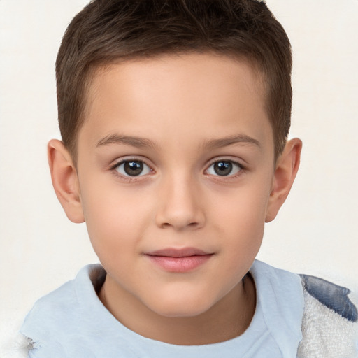 Joyful white child female with short  brown hair and brown eyes