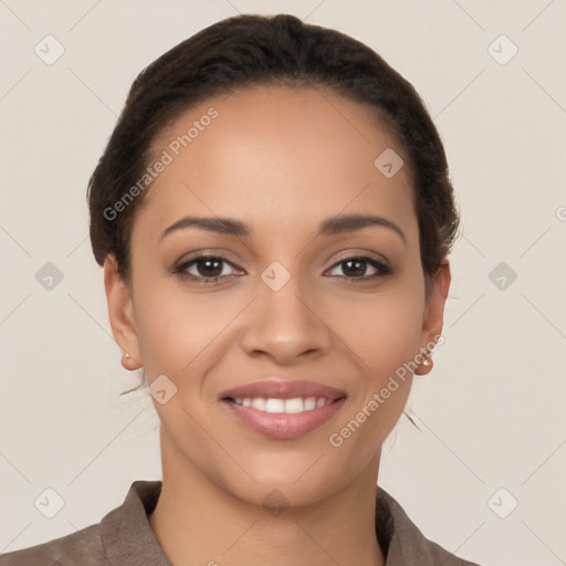 Joyful latino young-adult female with short  brown hair and brown eyes