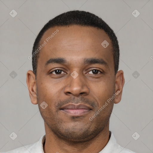 Neutral latino young-adult male with short  brown hair and brown eyes
