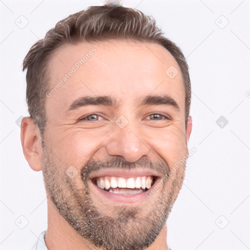 Joyful white adult male with short  brown hair and brown eyes