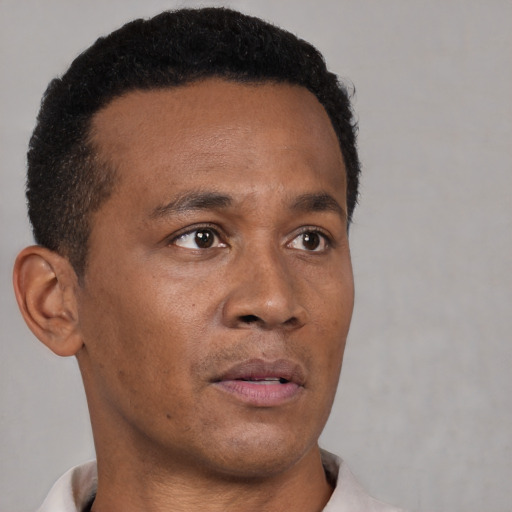 Neutral black young-adult male with short  brown hair and brown eyes