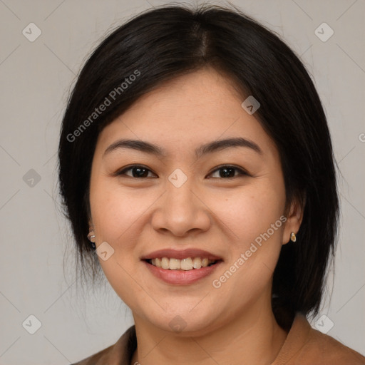 Joyful latino young-adult female with medium  brown hair and brown eyes