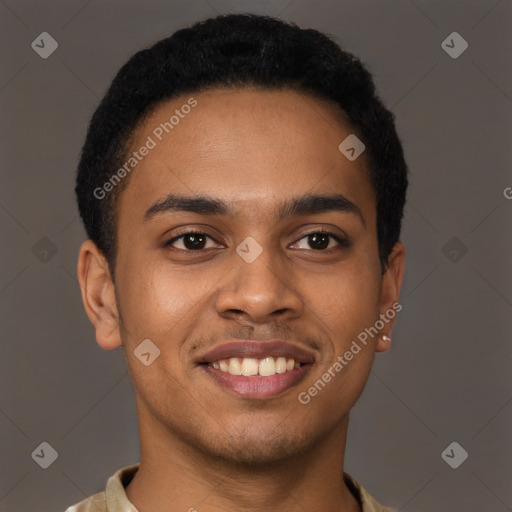 Joyful black young-adult male with short  brown hair and brown eyes