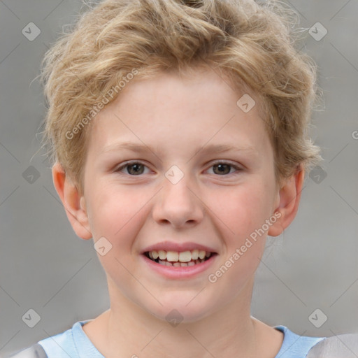 Joyful white child male with short  brown hair and brown eyes