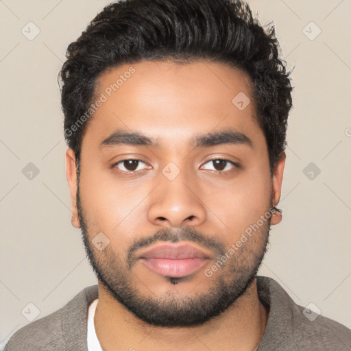 Neutral latino young-adult male with short  black hair and brown eyes