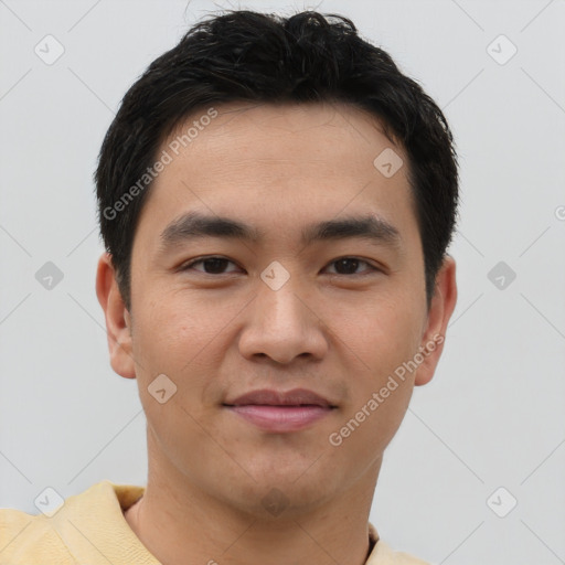 Joyful asian young-adult male with short  brown hair and brown eyes