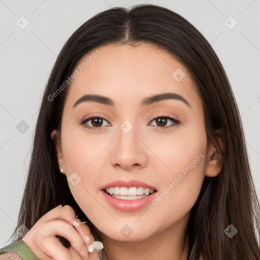 Joyful white young-adult female with long  brown hair and brown eyes