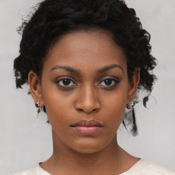 Neutral black young-adult female with short  black hair and brown eyes