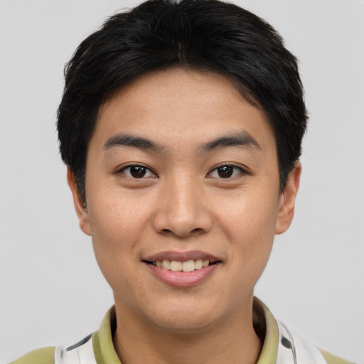 Joyful asian young-adult female with short  brown hair and brown eyes