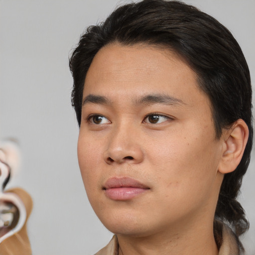 Neutral asian young-adult male with short  black hair and brown eyes