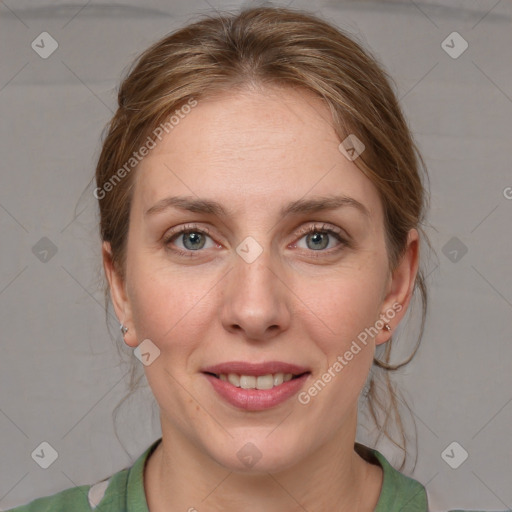 Joyful white adult female with medium  brown hair and grey eyes