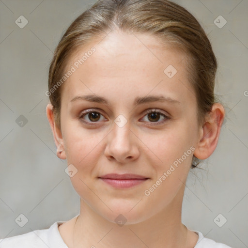 Joyful white child female with medium  brown hair and brown eyes